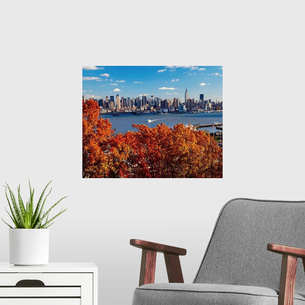 A modern room featuring New York City, Manhattan skyline, view from New Jersey
