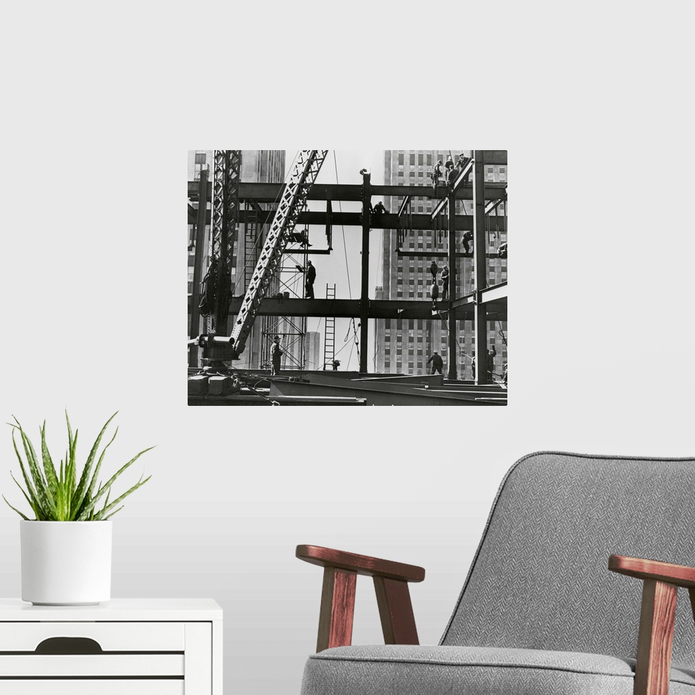 A modern room featuring Iron Workers Raise Steel At 32nd Floor Of Esso Building In New York City