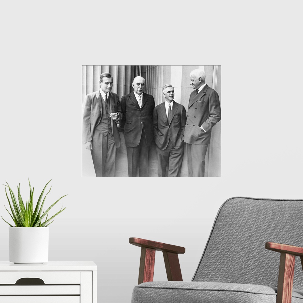 A modern room featuring J.P. Morgan Jr. with a few of his partners at the Senate Banking and Currency Committee hearings....