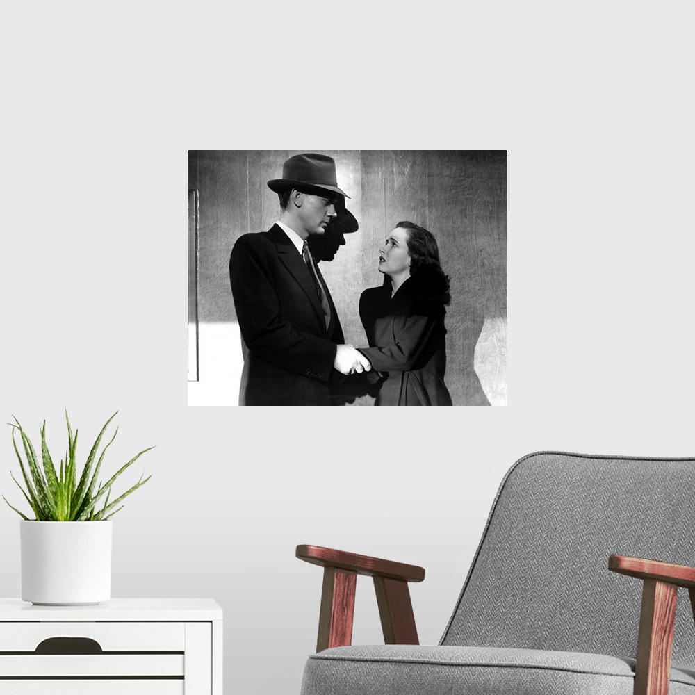 A modern room featuring Joseph Cotten and Teresa Wright in Shadow Of A Doubt - Movie Still