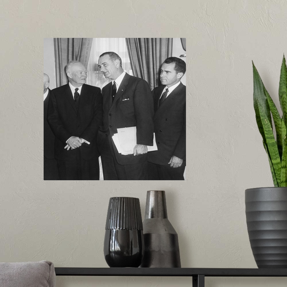 A modern room featuring President Eisenhower and future Presidents Lyndon Johnson and Richard Nixon. White House Oval Off...