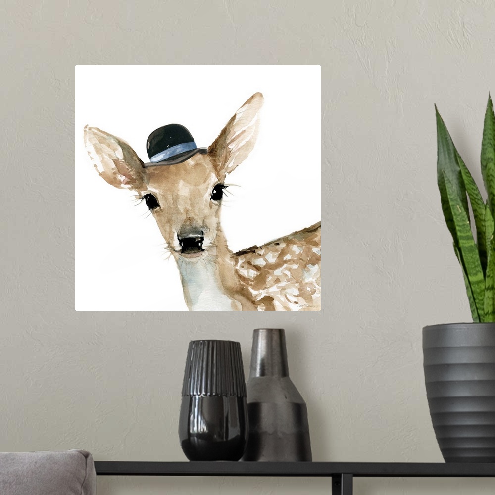 A modern room featuring Watercolor painting of a doe wearing a small black hat with a blue stripe on a white square backg...