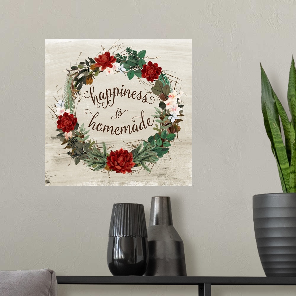 A modern room featuring A wreath of red succulents, flowers and various foliage  surround the words, "Happiness is homema...
