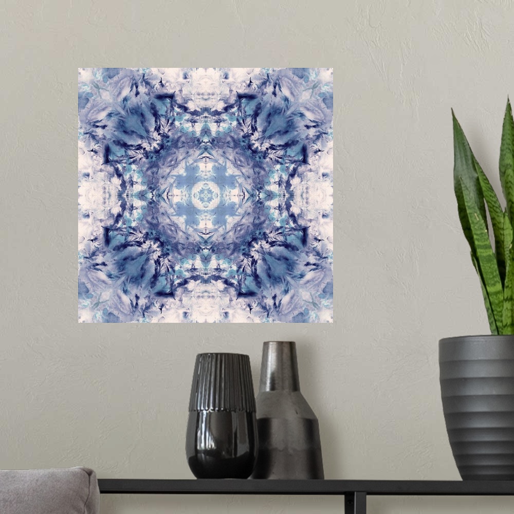 A modern room featuring Square abstract art in shades of blue and white hues with kaleidoscope-like patterns and designs.