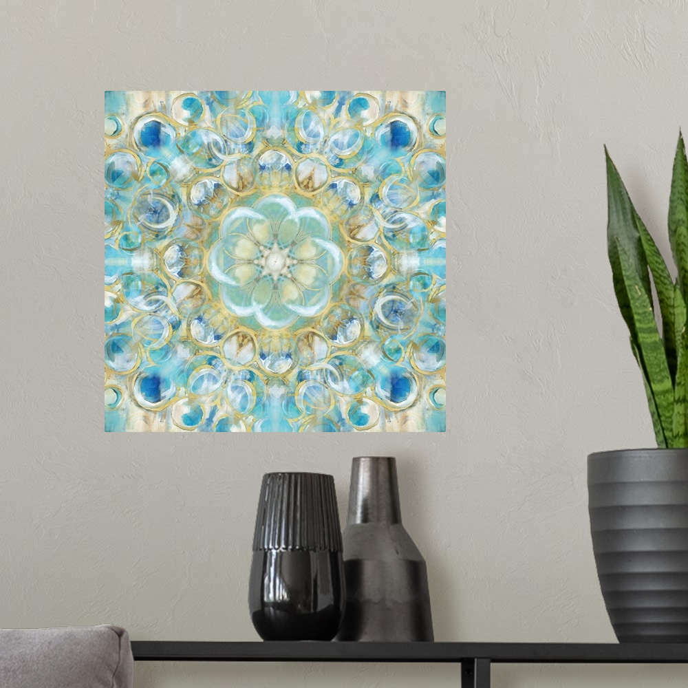 A modern room featuring Kaleidoscope art with circular shapes forming together in shades of blue, white, and gold on a sq...