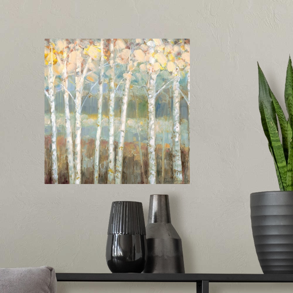 A modern room featuring Square painting of an abstract  tree covered landscape with light hues.