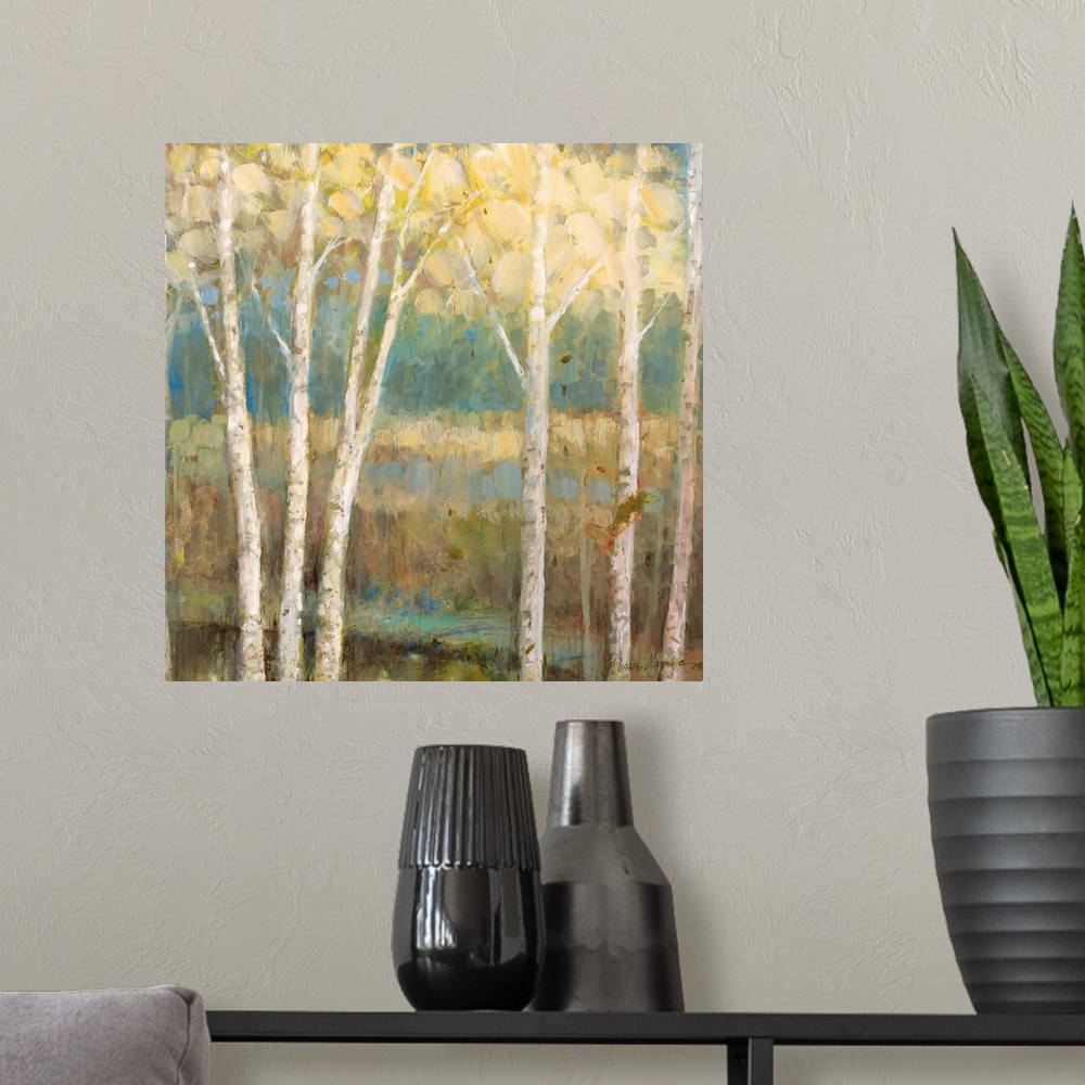 A modern room featuring Square painting of an abstract  tree covered landscape with dark hues.
