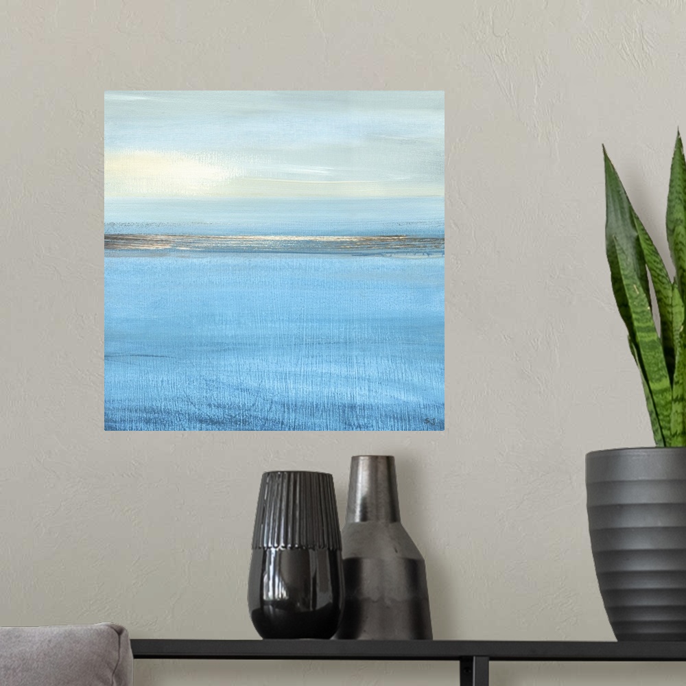 A modern room featuring Square abstract painting of a seascape.