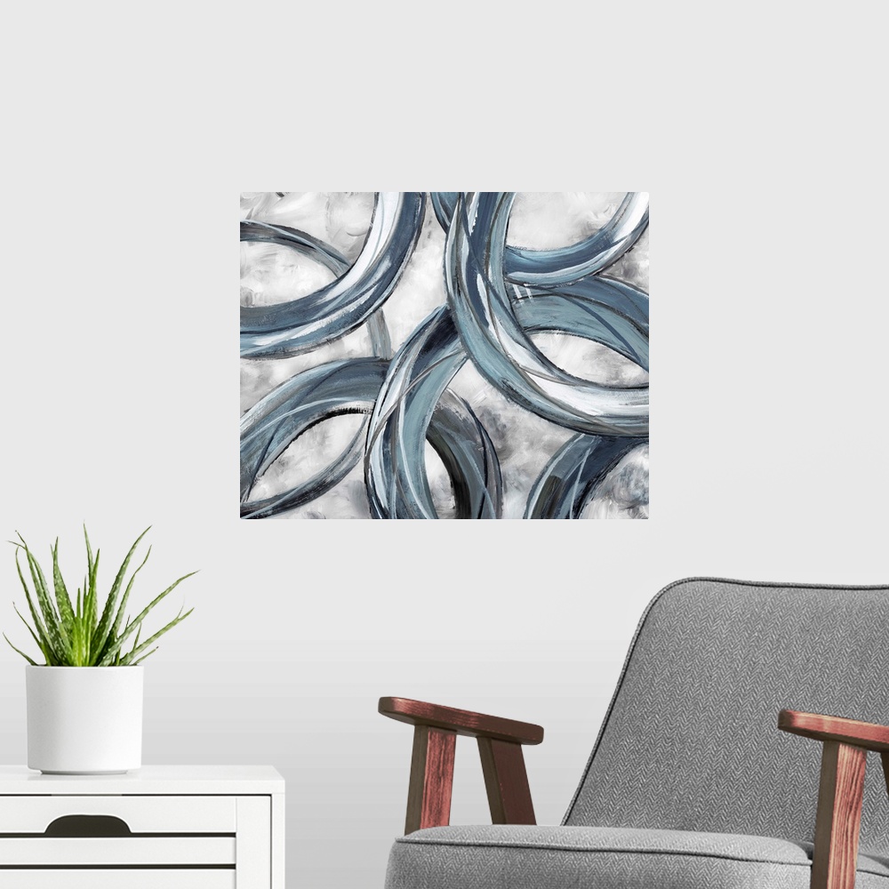 A modern room featuring Partially hidden rings of blue and gray brush strokes are displayed against a light background in...