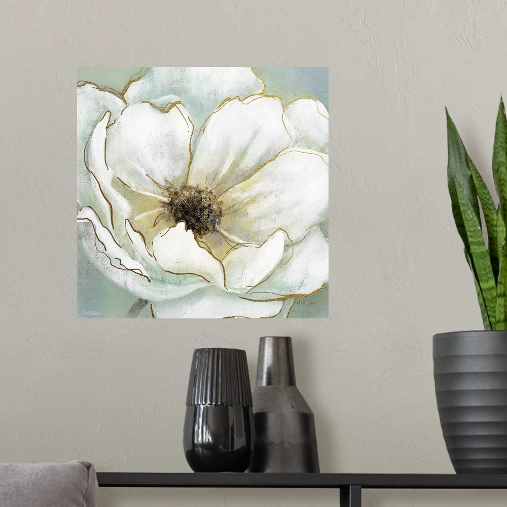 A modern room featuring Contemporary square painting of a white flower with metallic gold highlights on a green-blue back...