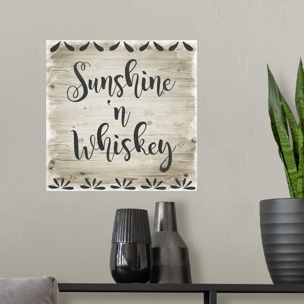 A modern room featuring "Sunshine n' Whiskey" placed on a wood texture with decorative elements lining the top and bottom.
