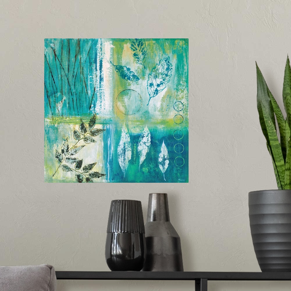 A modern room featuring Square painting divided into four sections with different leaf prints in each, made with teal, gr...