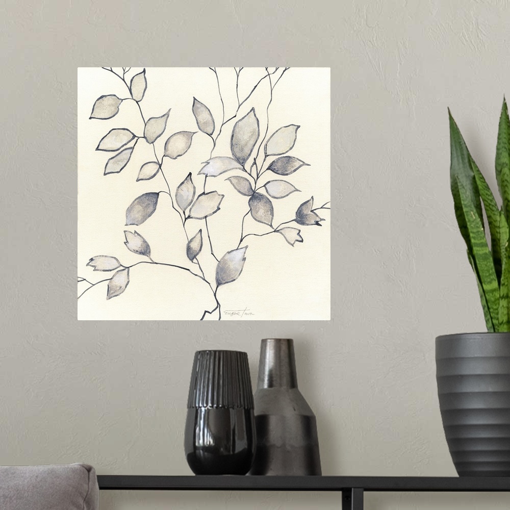 A modern room featuring Square painting of leaves with thin branches in shades of white and grey.