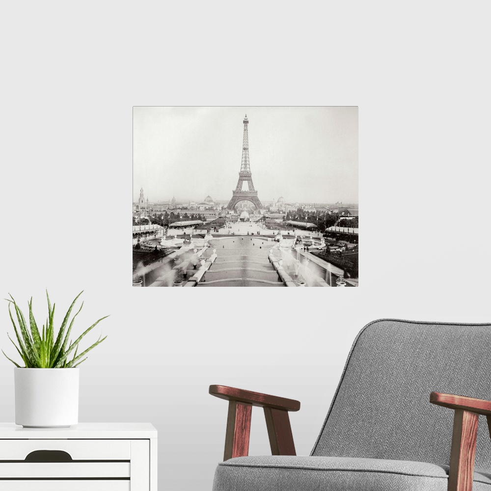 A modern room featuring A vintage photograph of the Eiffel Tower in Paris.