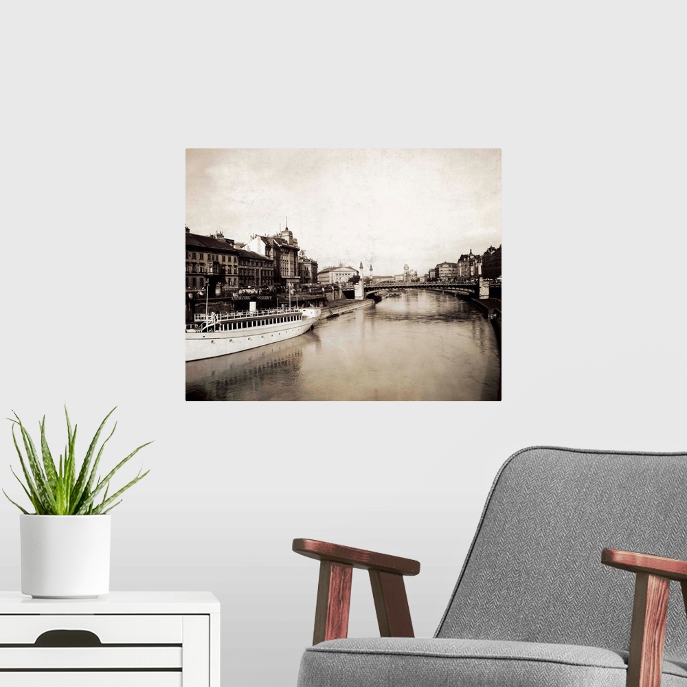 A modern room featuring Photo shows the Schwedenbrucke over the Danube River. The bridge is made famous by the popular co...