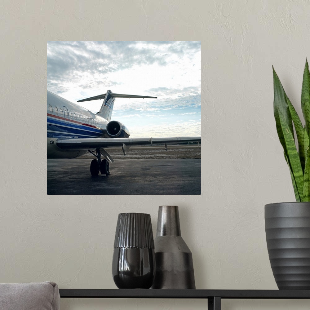 A modern room featuring Airplane on the runway of an airport
