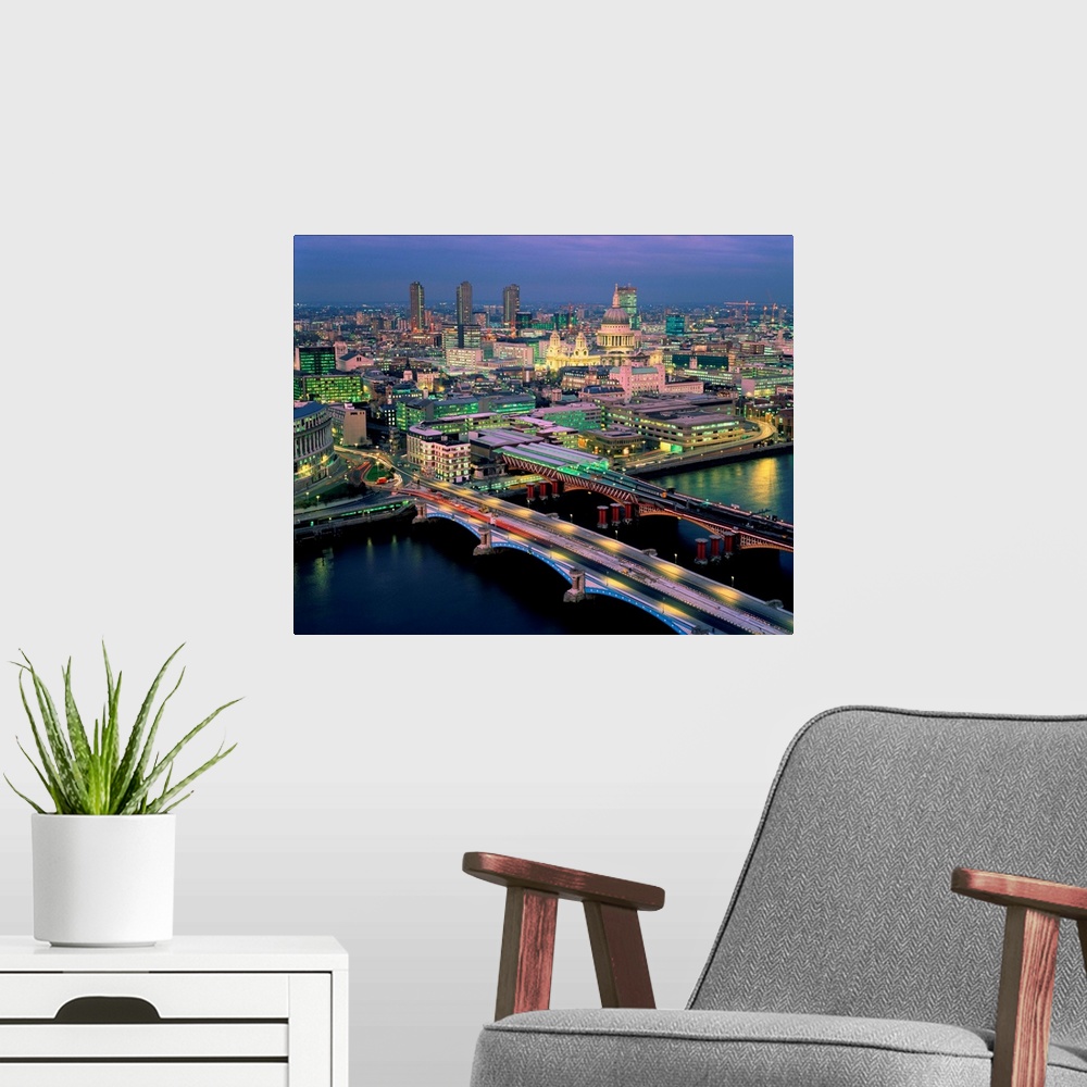 A modern room featuring England,London,Blackfriar's Bridge, St.Paul's and The City,dusk