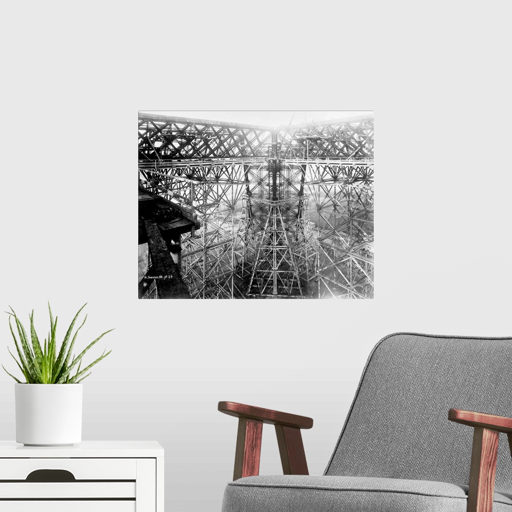 A modern room featuring Eiffel Tower under construction. Intricate mass of ironwork at the level of the first platform wi...