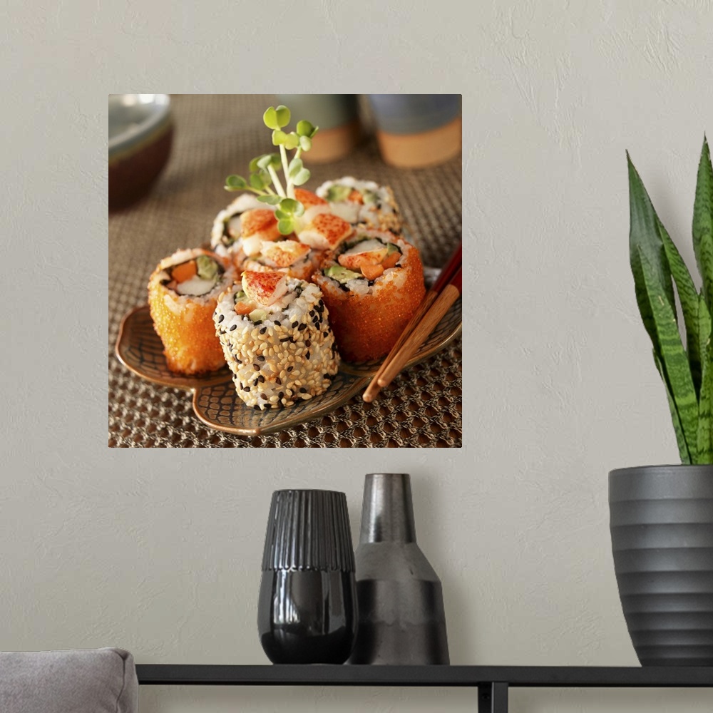 A modern room featuring Lobster sushi rolls on plate