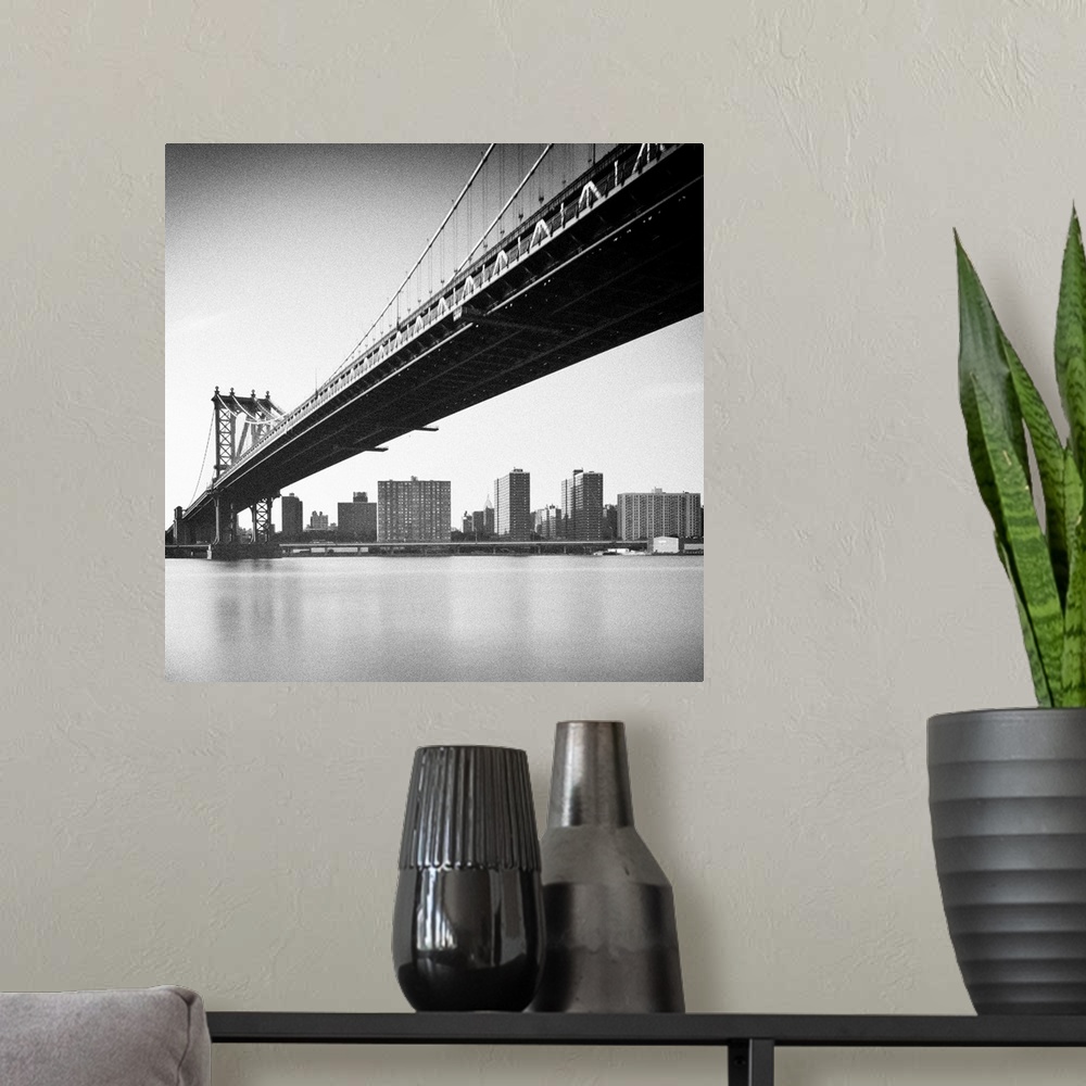A modern room featuring Manhattan Bridge and skyline, New York, US.
