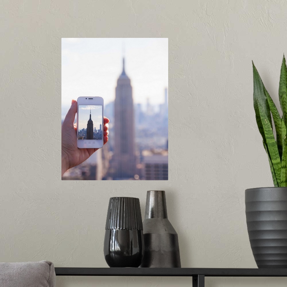 A modern room featuring USA, New York State, New York City, Manhattan, Tourist taking photo of Empire State Building