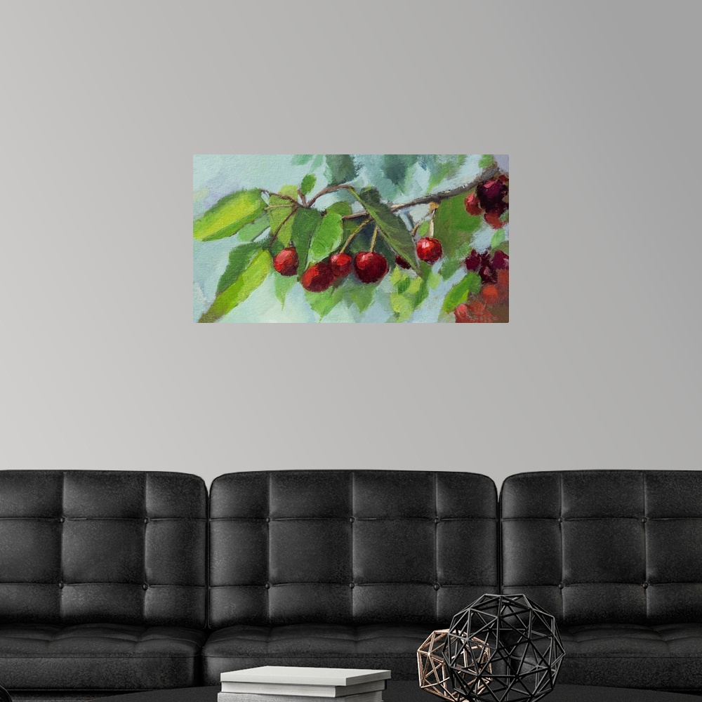 A modern room featuring Bright scarlet cherries on a branch.