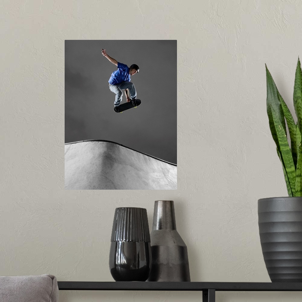 A modern room featuring Skateboarder Performing Tricks
