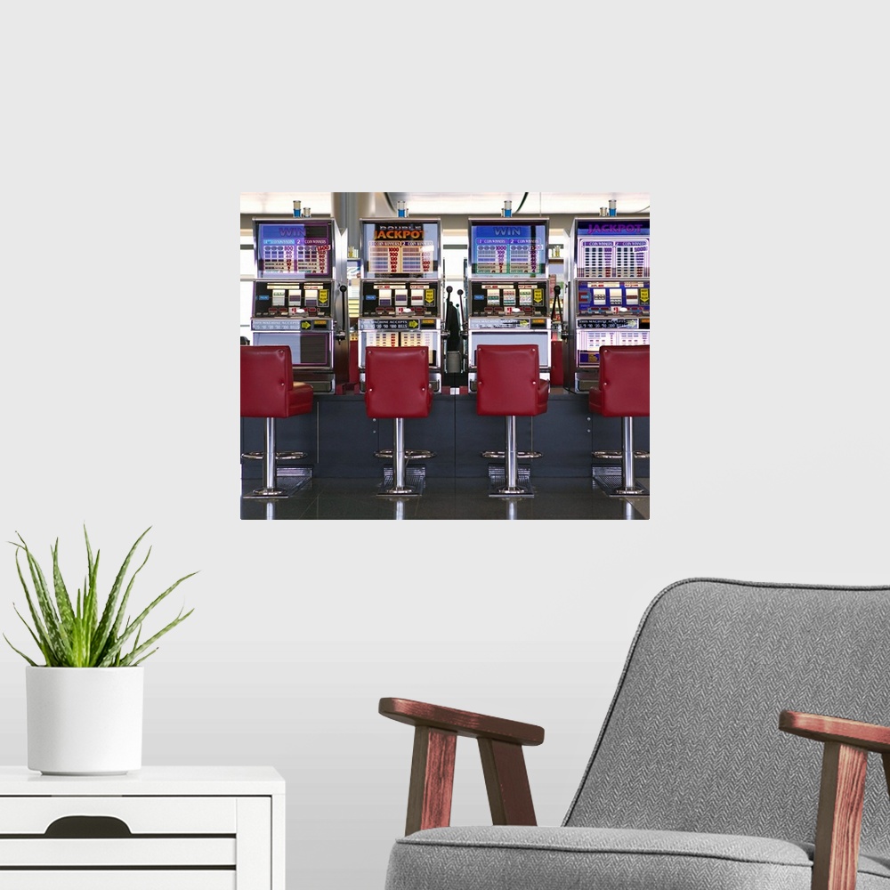 A modern room featuring Slot machines