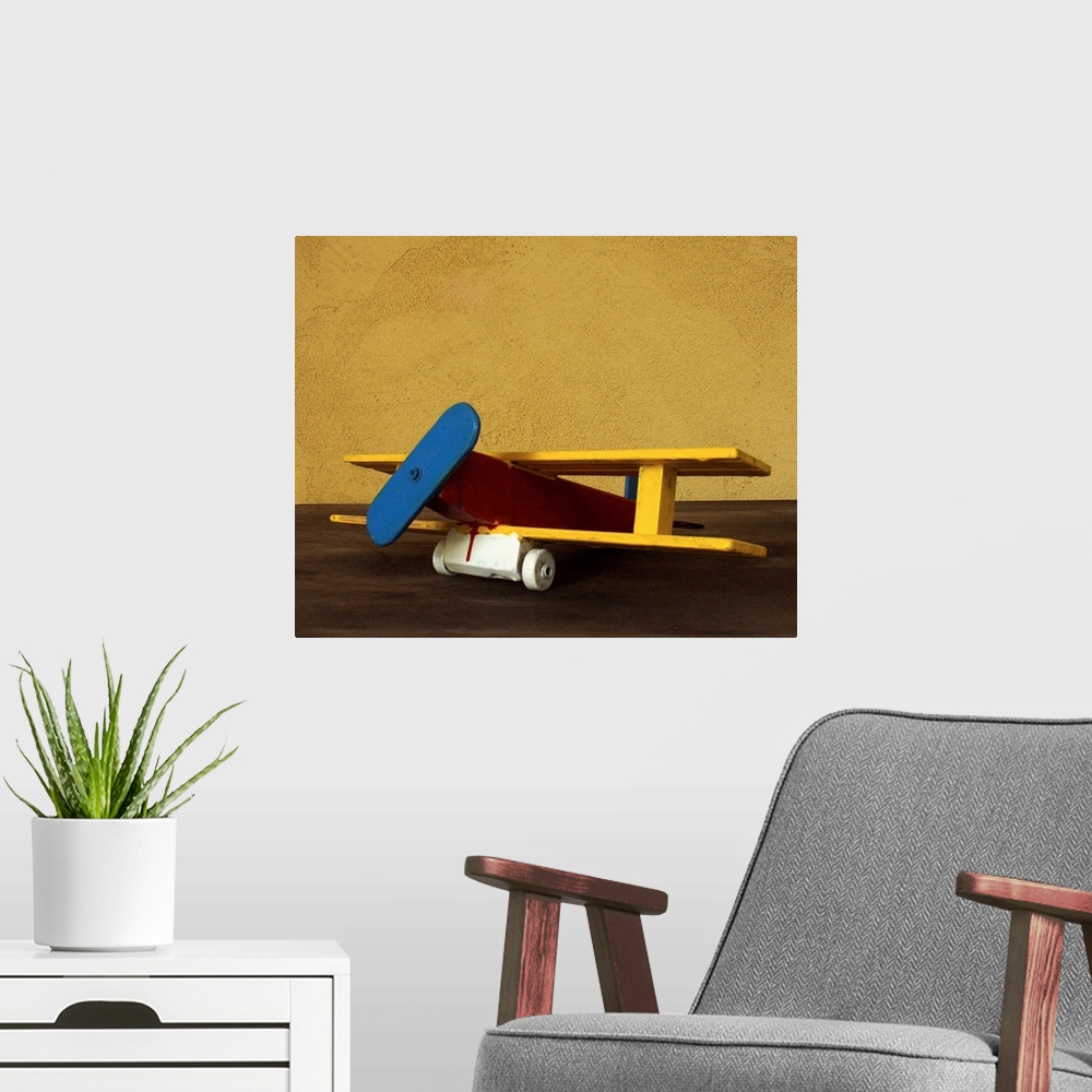 A modern room featuring Toy wooden airplane