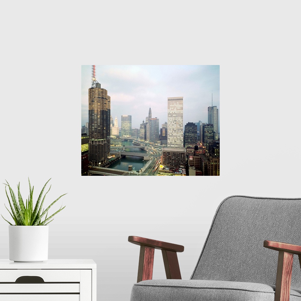 A modern room featuring Looking east with Chicago River in pictures, buildings are (left foreground, clockwise): Marine C...