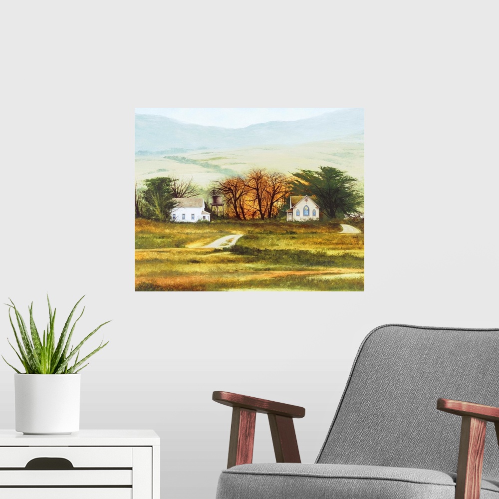 A modern room featuring Contemporary landscape painting of a countryside church and house with rolling hills in the backg...