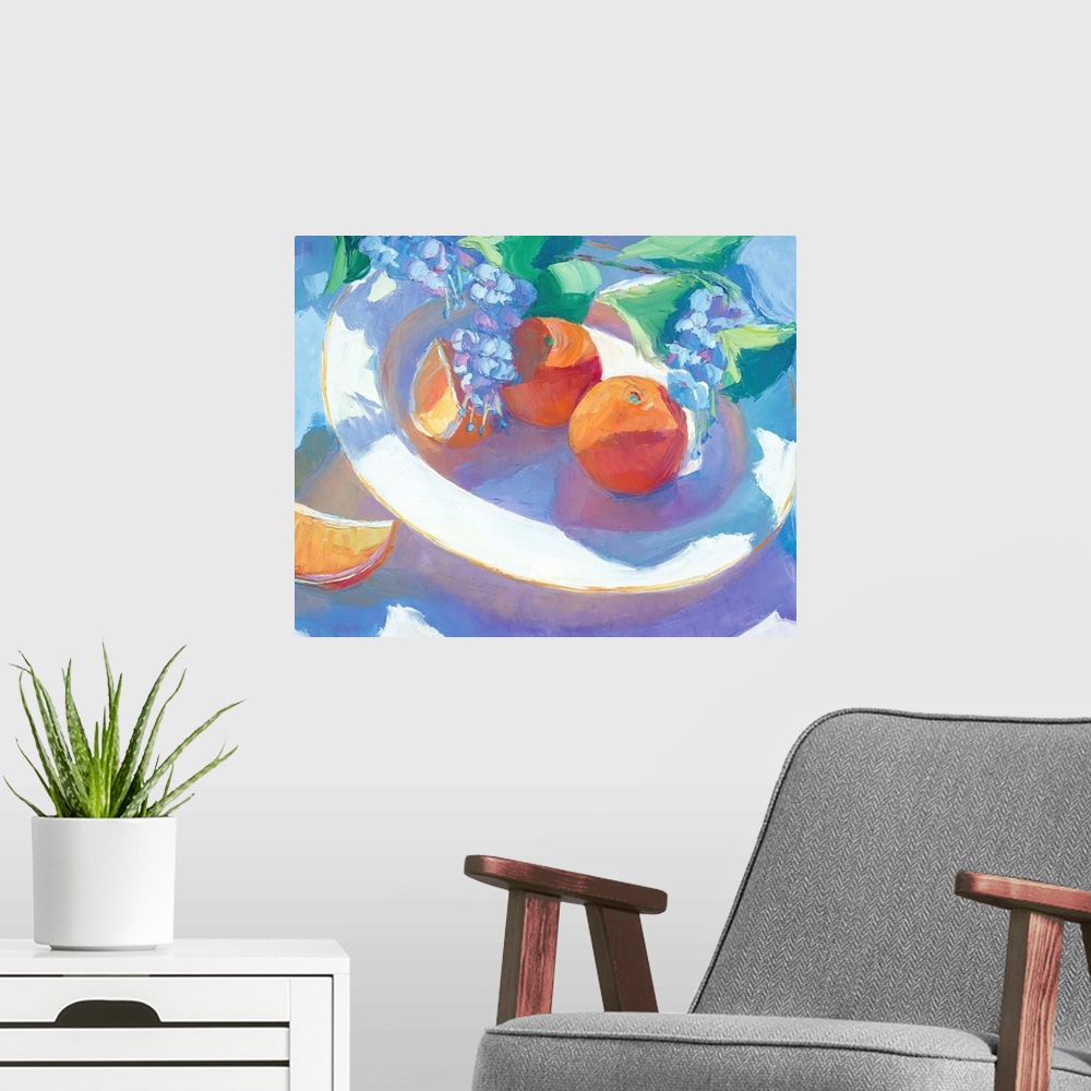 A modern room featuring A contemporary still-life painting of fruit on a plate.