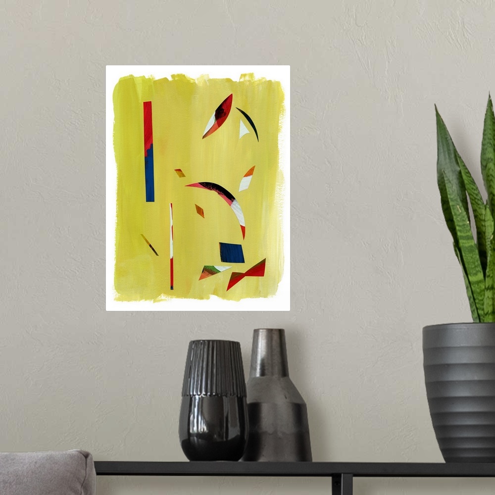 A modern room featuring Mod abstract art with red and blue shapes on green.