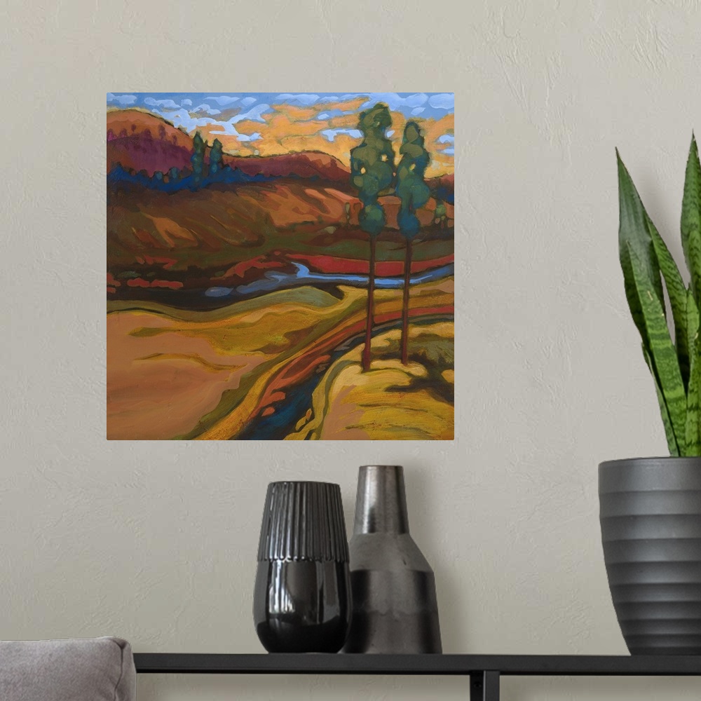 A modern room featuring Contemporary landscape painting of a river valley in autumn colors.