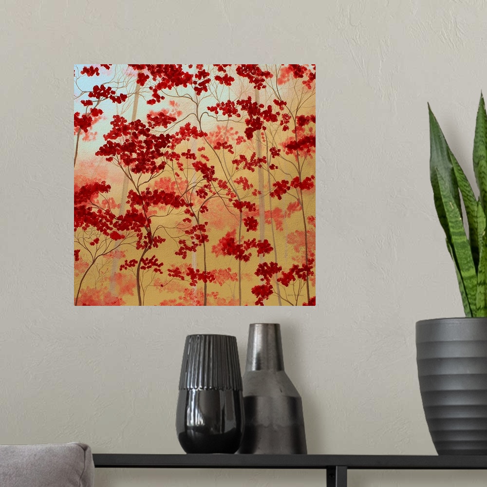 A modern room featuring Painting of bold red trees on a golden background.