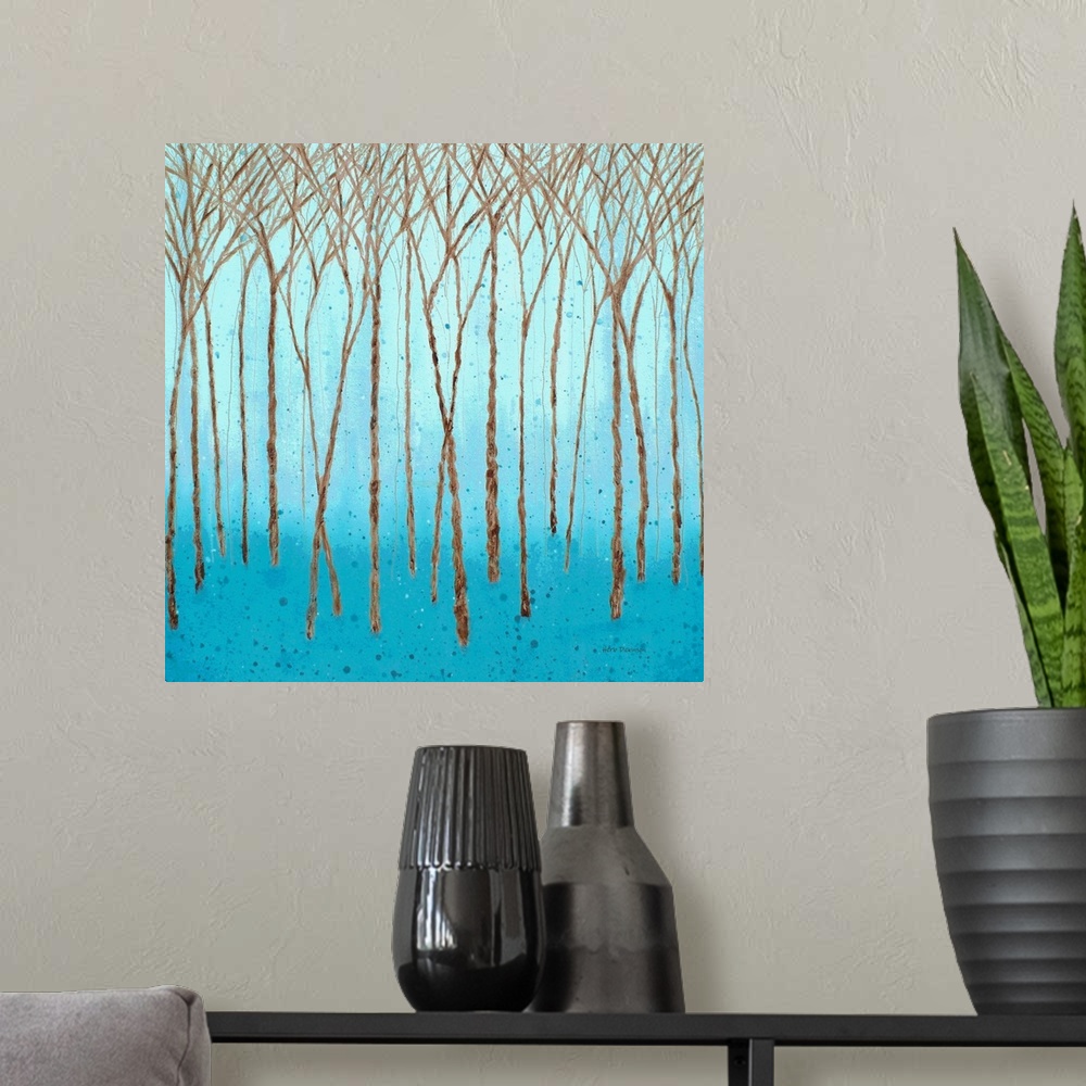 A modern room featuring Brown Winter trees on a square background made with shades of blue and paint splatter.