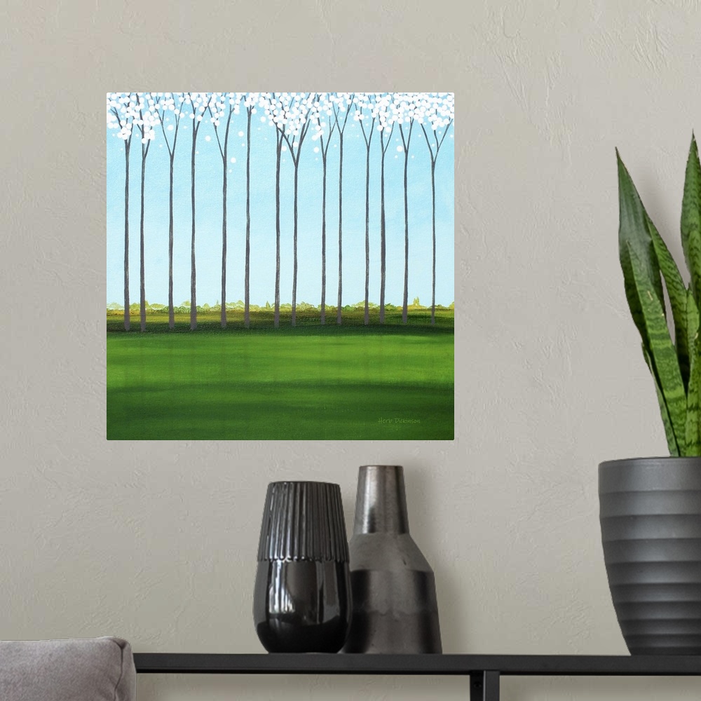 A modern room featuring Square minimalist painting of tall, skinny trees with white blossoms.