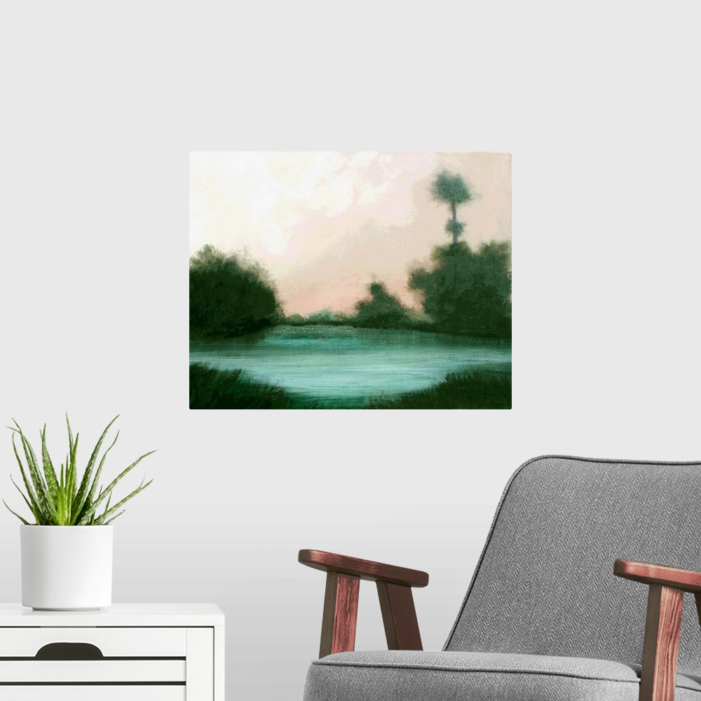 A modern room featuring Impressionist painting of a lake landscape with emerald trees surrounding it and a pale pink sky.