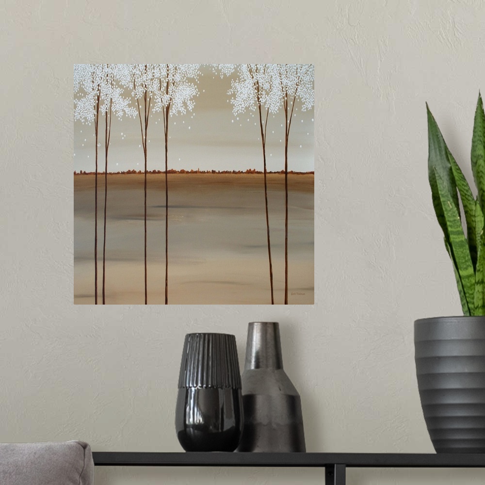 A modern room featuring Minimalist square painting of tall Spring trees with white blossoms.