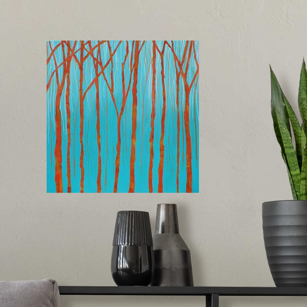 A modern room featuring Simple landscape painting with bare orange tree trunks and branches on a bright blue background.