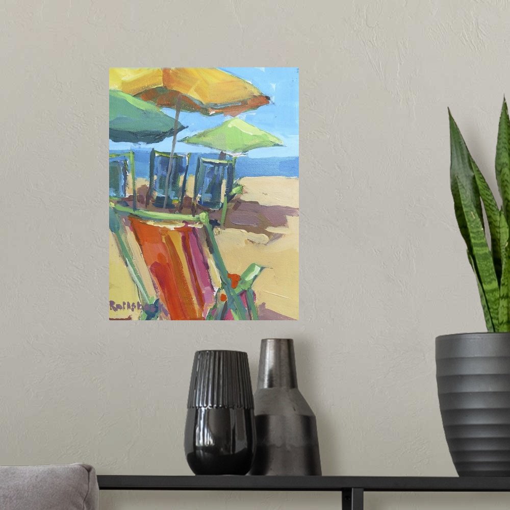 A modern room featuring A coastal themed painting of colorful chairs sitting on a beach.