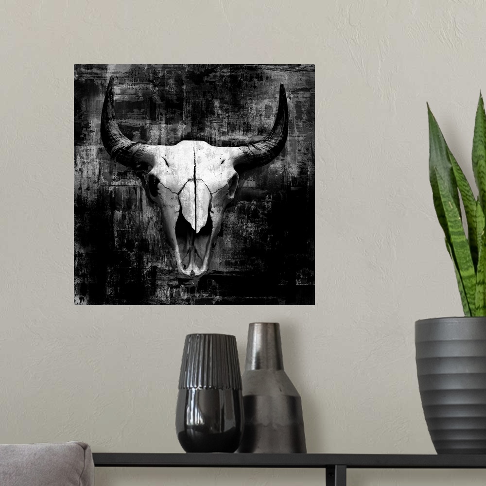 A modern room featuring A digital illustration of a cow skull in black and white with a rustic textured effect.