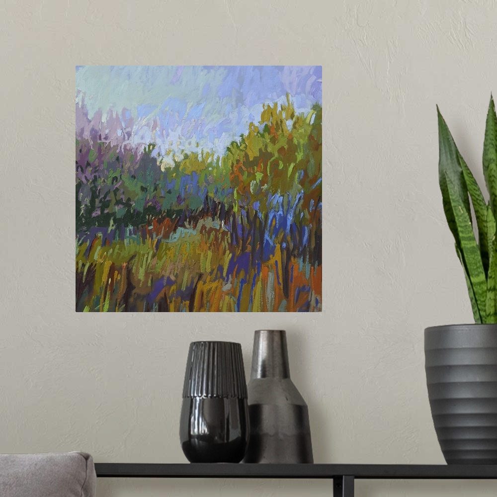 A modern room featuring Semi-abstract painting of a grassy field lined with trees.
