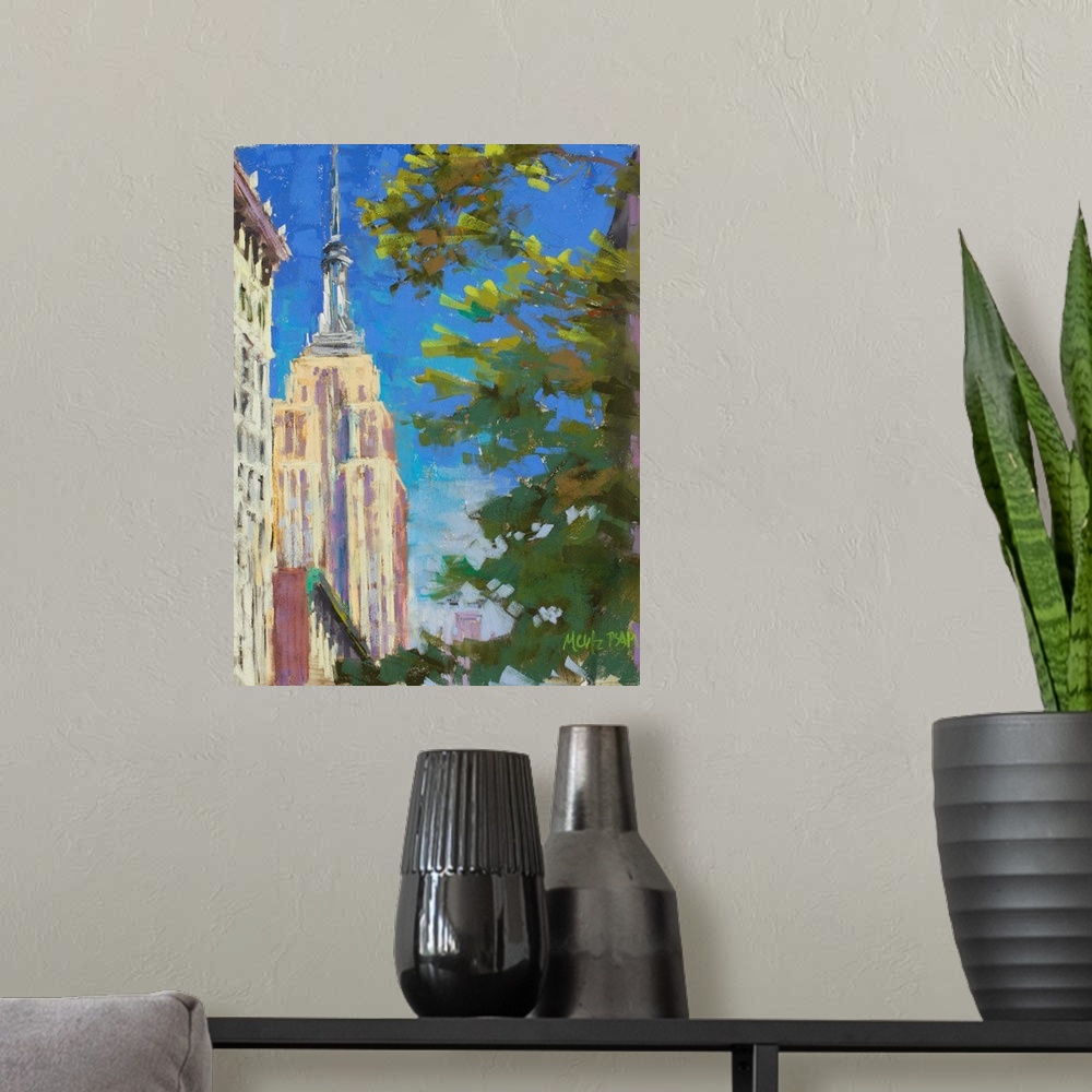 A modern room featuring A contemporary painting of the Empire States Building with a tree in the foreground.