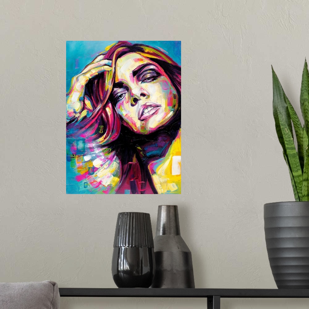 A modern room featuring Vertical abstract portrait of a woman in vibrant colors.