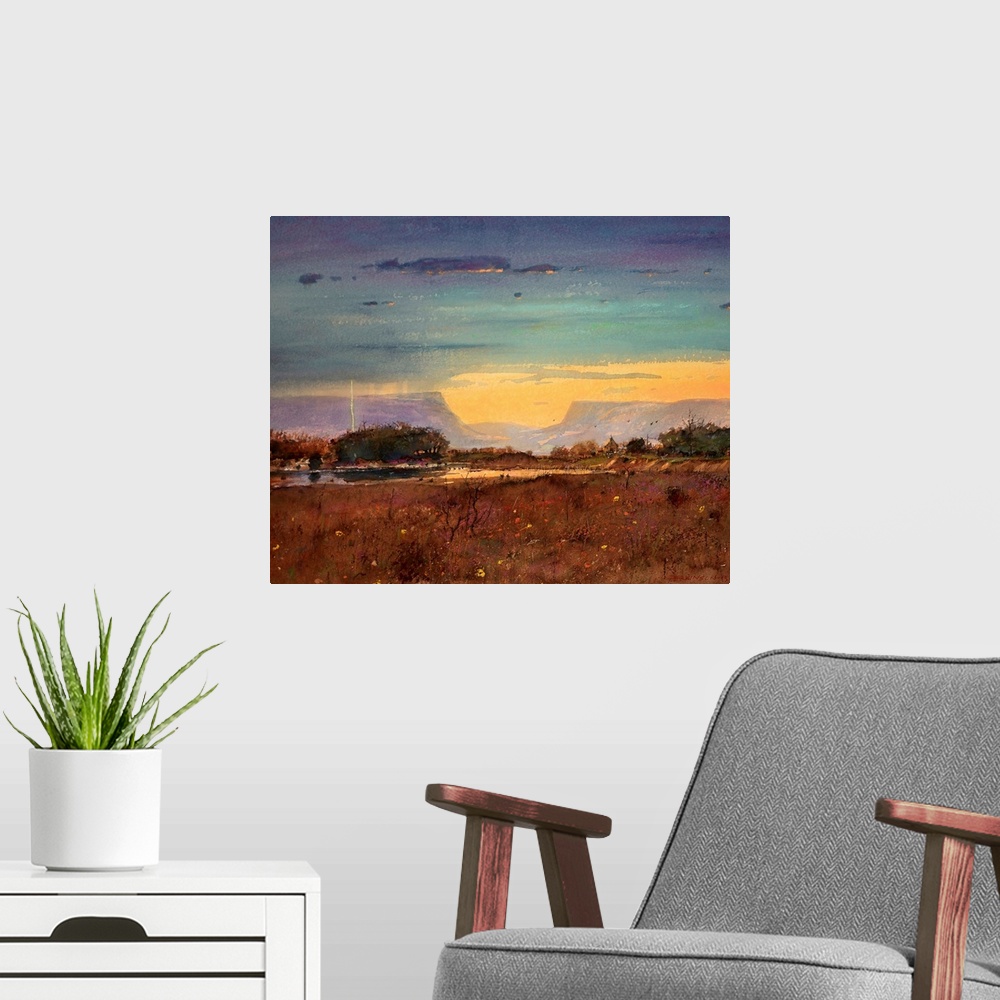 A modern room featuring A contemporary painting of a southwestern landscape under a stormy sky.
