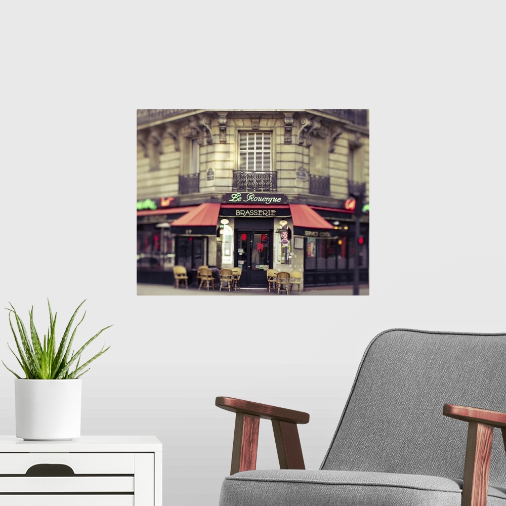 A modern room featuring Center focused photograph of a Parisian restaurant.