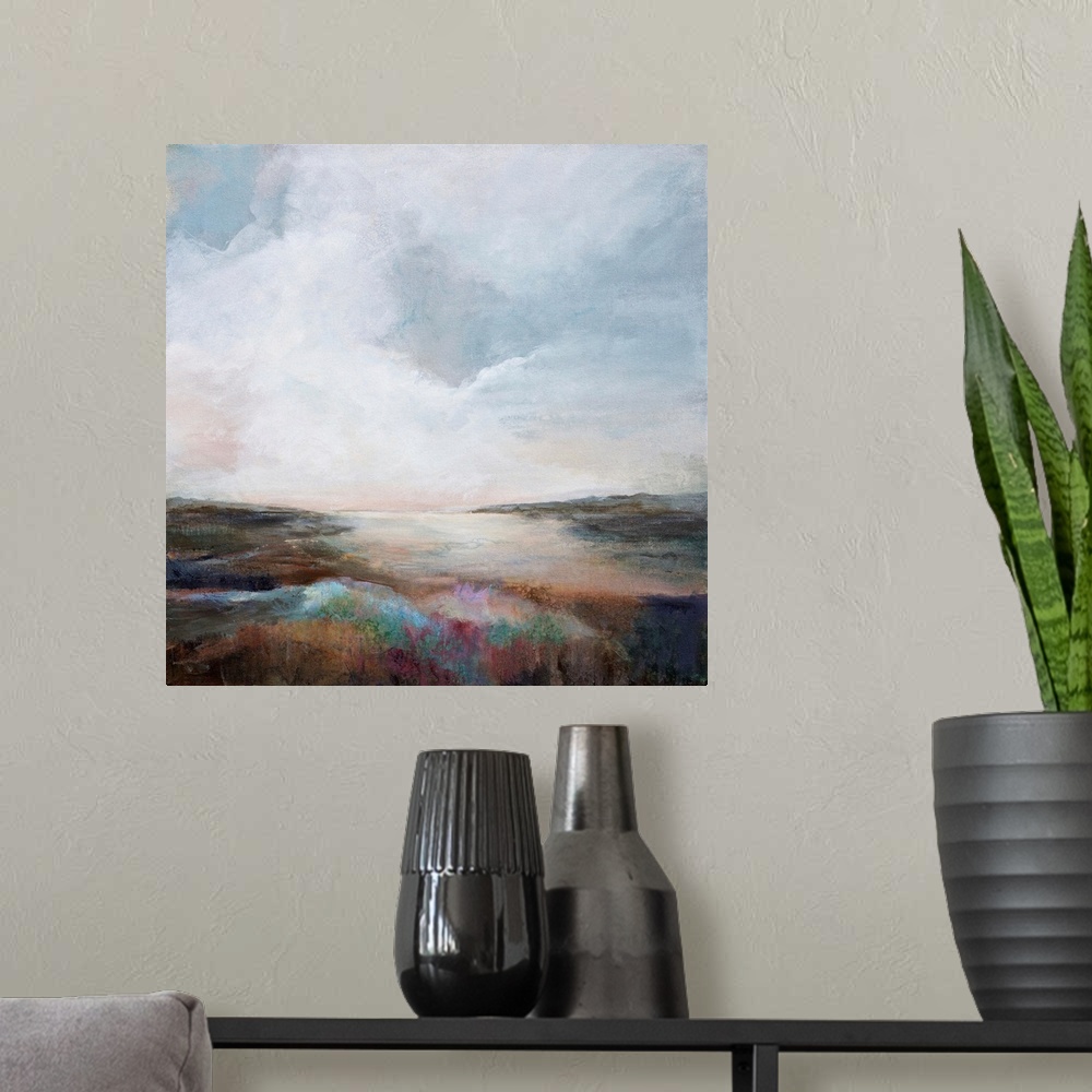 A modern room featuring Abstract landscape painting in muted hues.