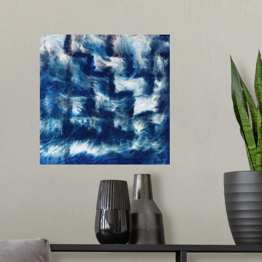 A modern room featuring Shibori folds of indigo step across the canvas.