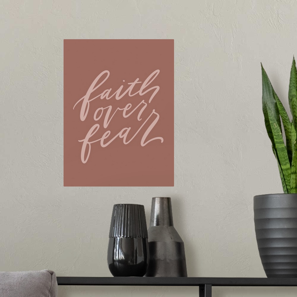 A modern room featuring Faith Over Fear